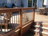 Beautiful custom designed woodwork is part of this outdoor deck.